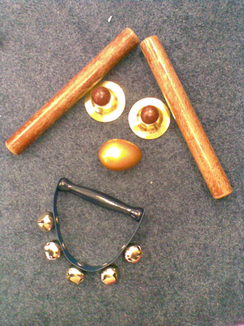 Age Appropriate instruments for 3-5 year-old in a playful face-shaped formation